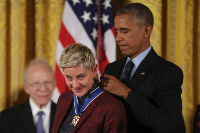 President Barack Obama presents the Presidential Medal of Freedom to comedian and talk show host Ellen DeGeneres.