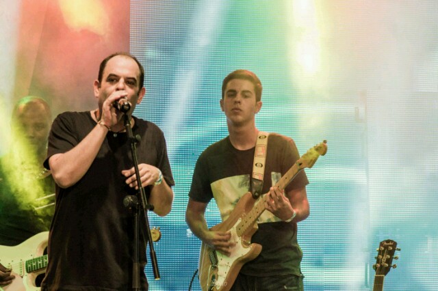 Gilad and son performing.