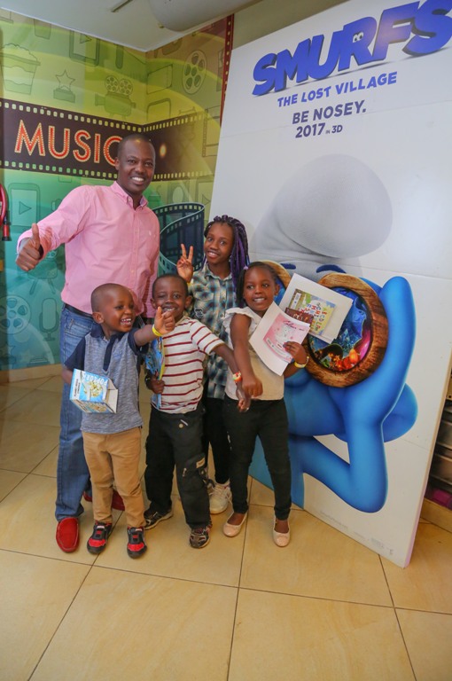 Multichoice Corporate Affairs Manager, Philip Wahome with kids.