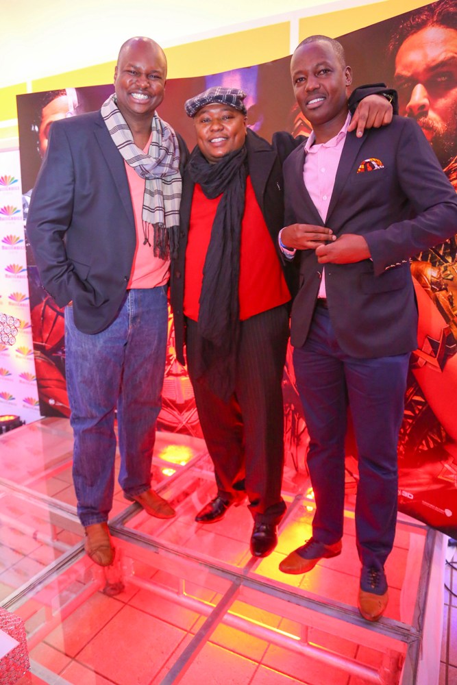 Multichoice Corporate Affairs Manager, Philip Wahome (R), with Capital FM Presenter, Macbul Mohammed (L) and didge.