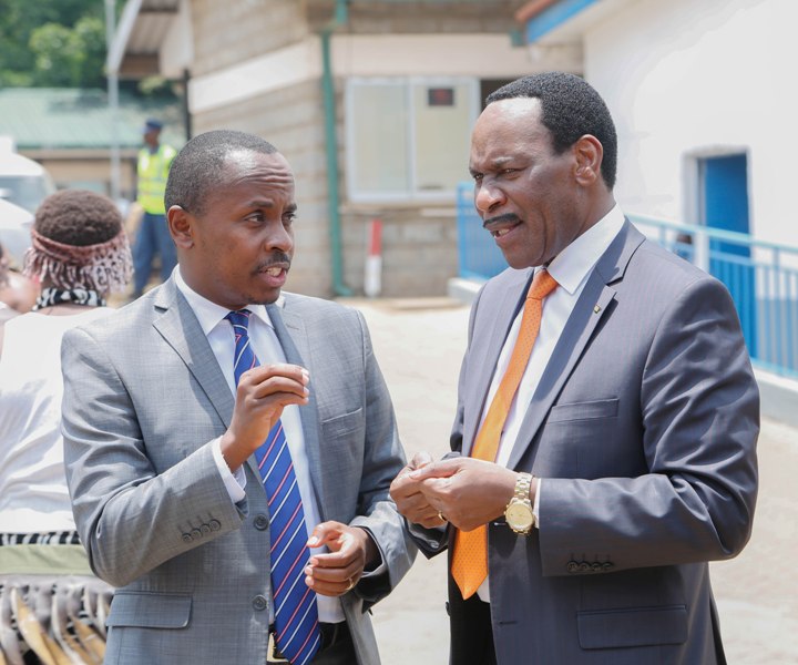 Kenya Film Classification Board CEO, Dr. Ezekiel Mutua (right) interacts with MP Dagoretti South, John Kiarie (left) during the Multichoice Talent Factory Academy launch at Local Productions facility.